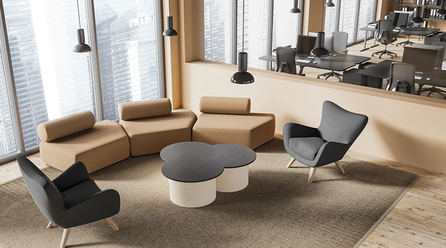 Lounge per ufficio con forme curve e design accogliente