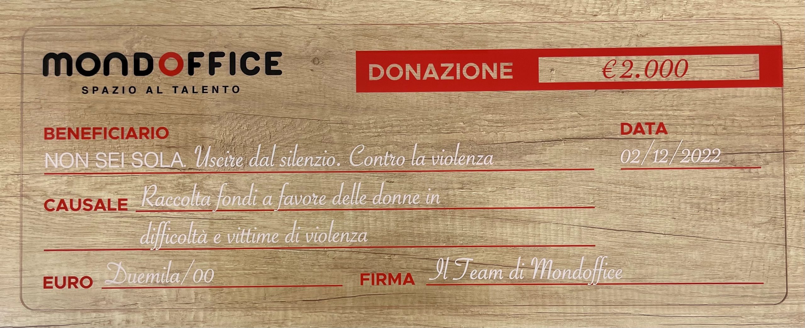 assegno donazione NON SEI SOLA Assegno donazione Mondoffice ad associazione NON SEI SOLA